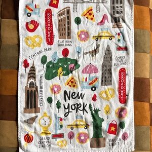 Isaac Mizrahi themed New York and London kitchen towels